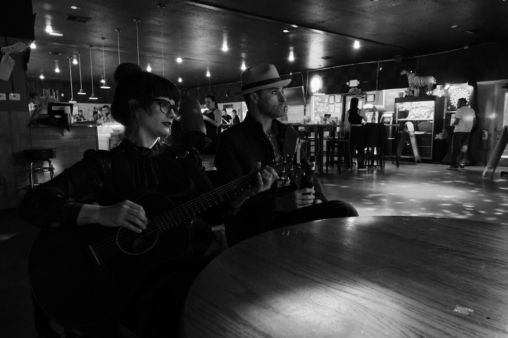 Black and white photo of Asian dub Foundation performing at Rock for Churchill