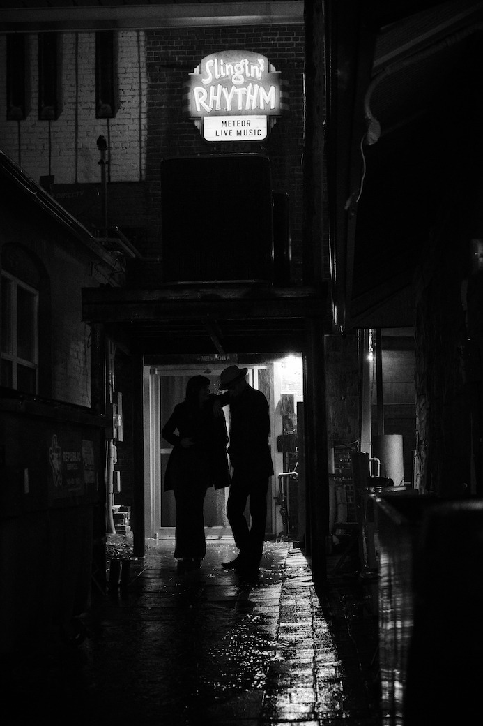 Black and white photo of Asian dub Foundation performing at Rock for Churchill