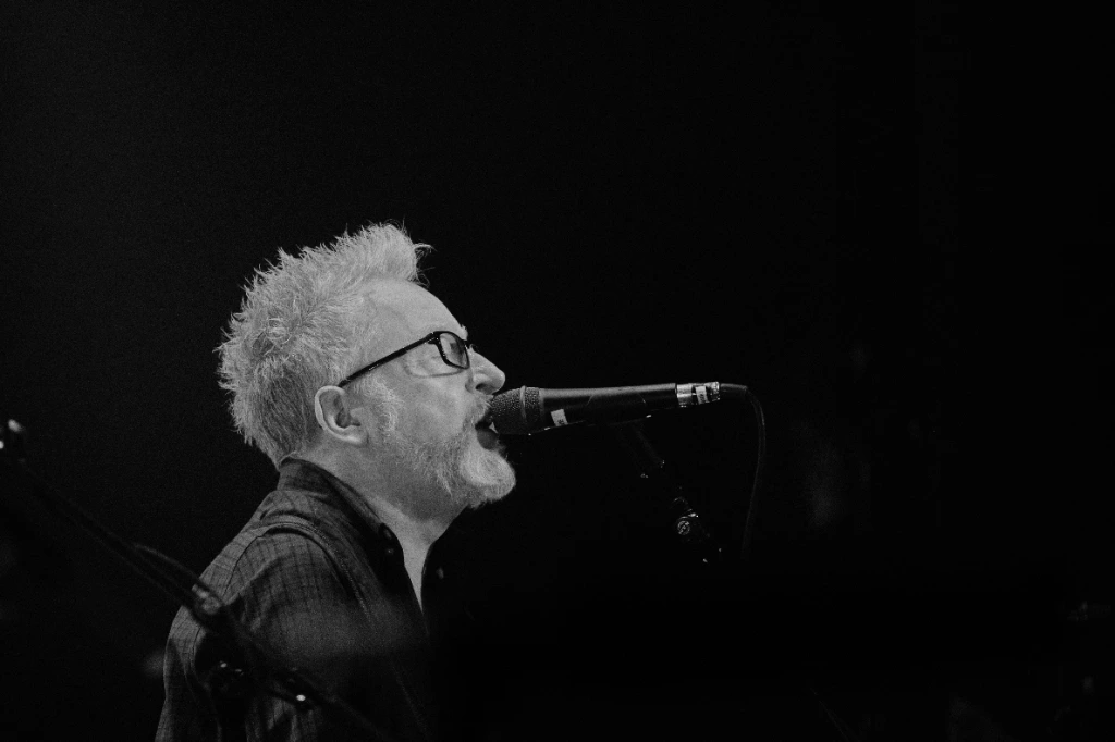Black and white photo of Asian dub Foundation performing at Rock for Churchill