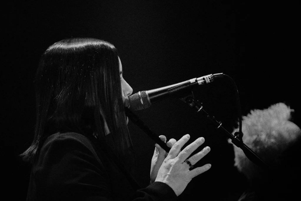 Black and white photo of Asian dub Foundation performing at Rock for Churchill