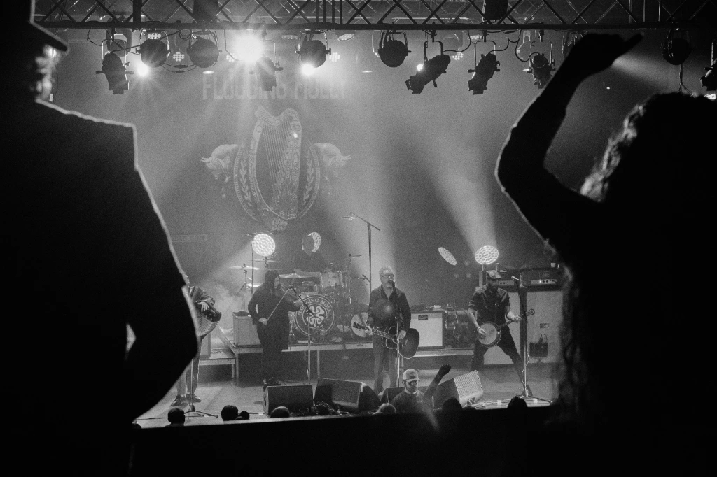 Black and white photo of Asian dub Foundation performing at Rock for Churchill