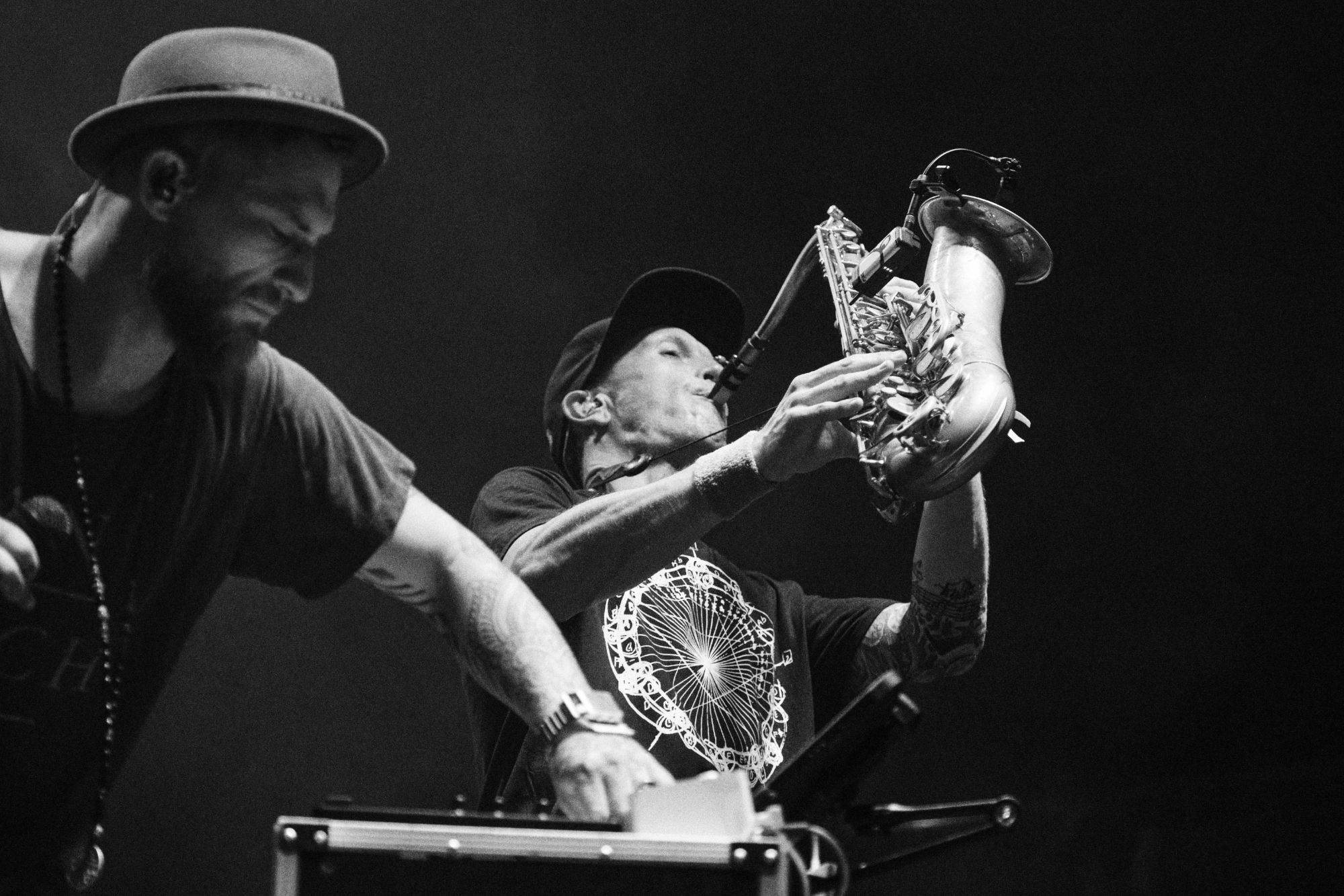 Black and white photo of DubFX and Mr. Woodnote performing live at Rock for Churchill