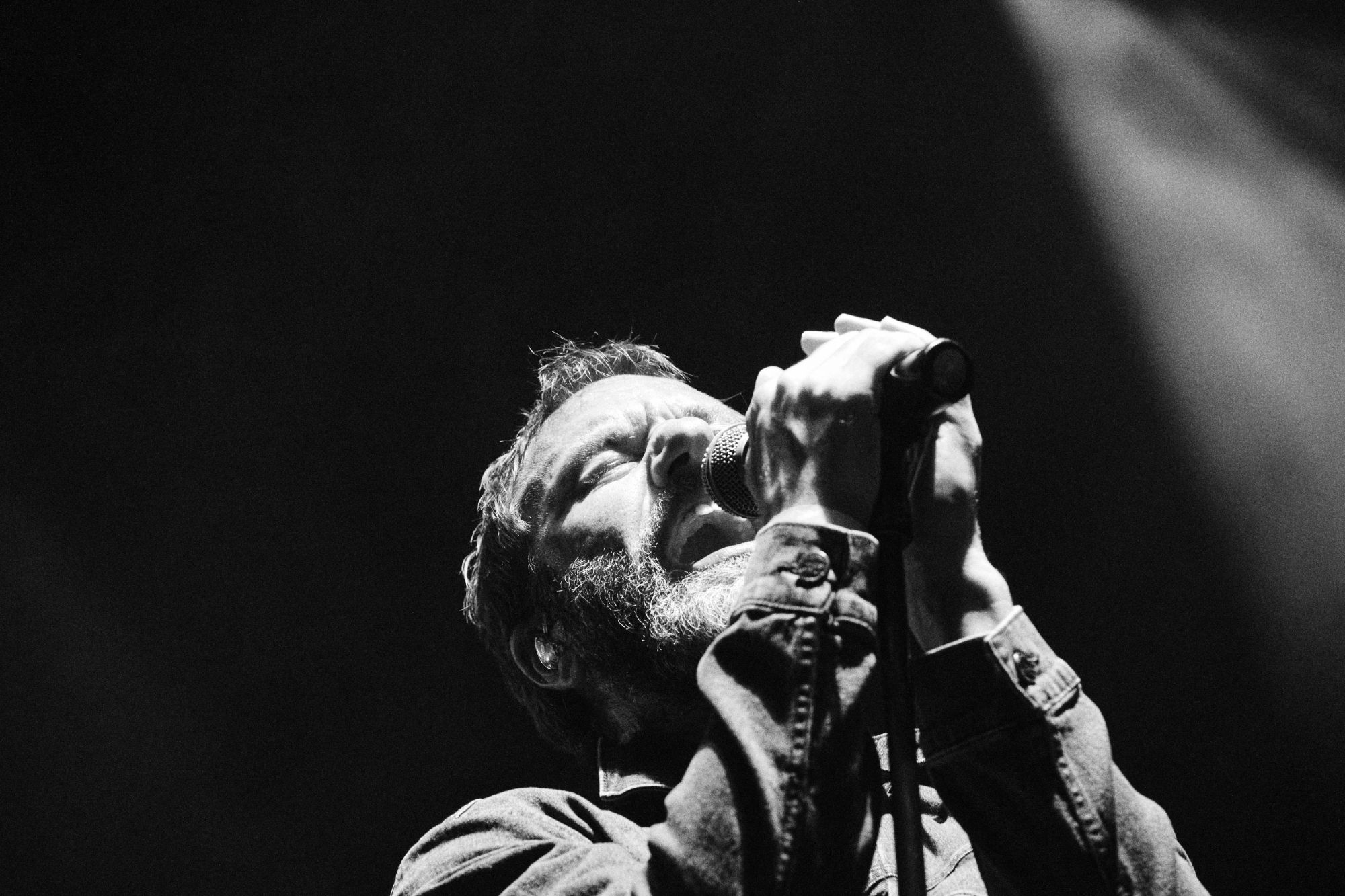 Black and white photo of lead singer from Tata Bojs