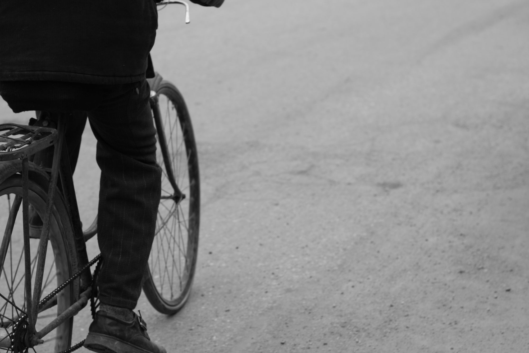 Black and white photo of cyclist in Romania